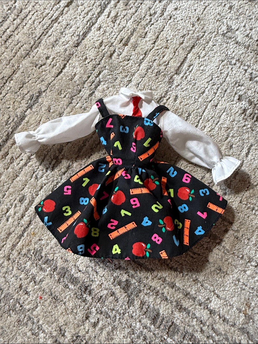 vintage 1995 Mattel Teacher Barbie doll outfit, featuring a black jumper dress